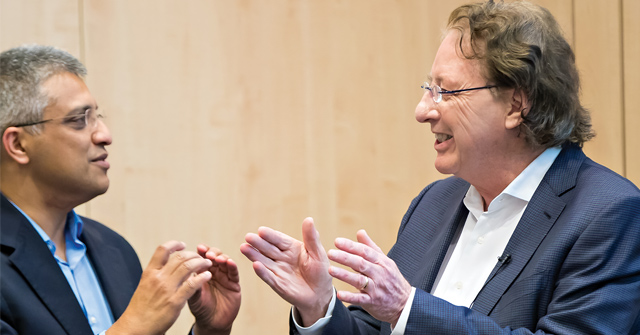 Dr. Kumar and Dr. Durie talking to each other