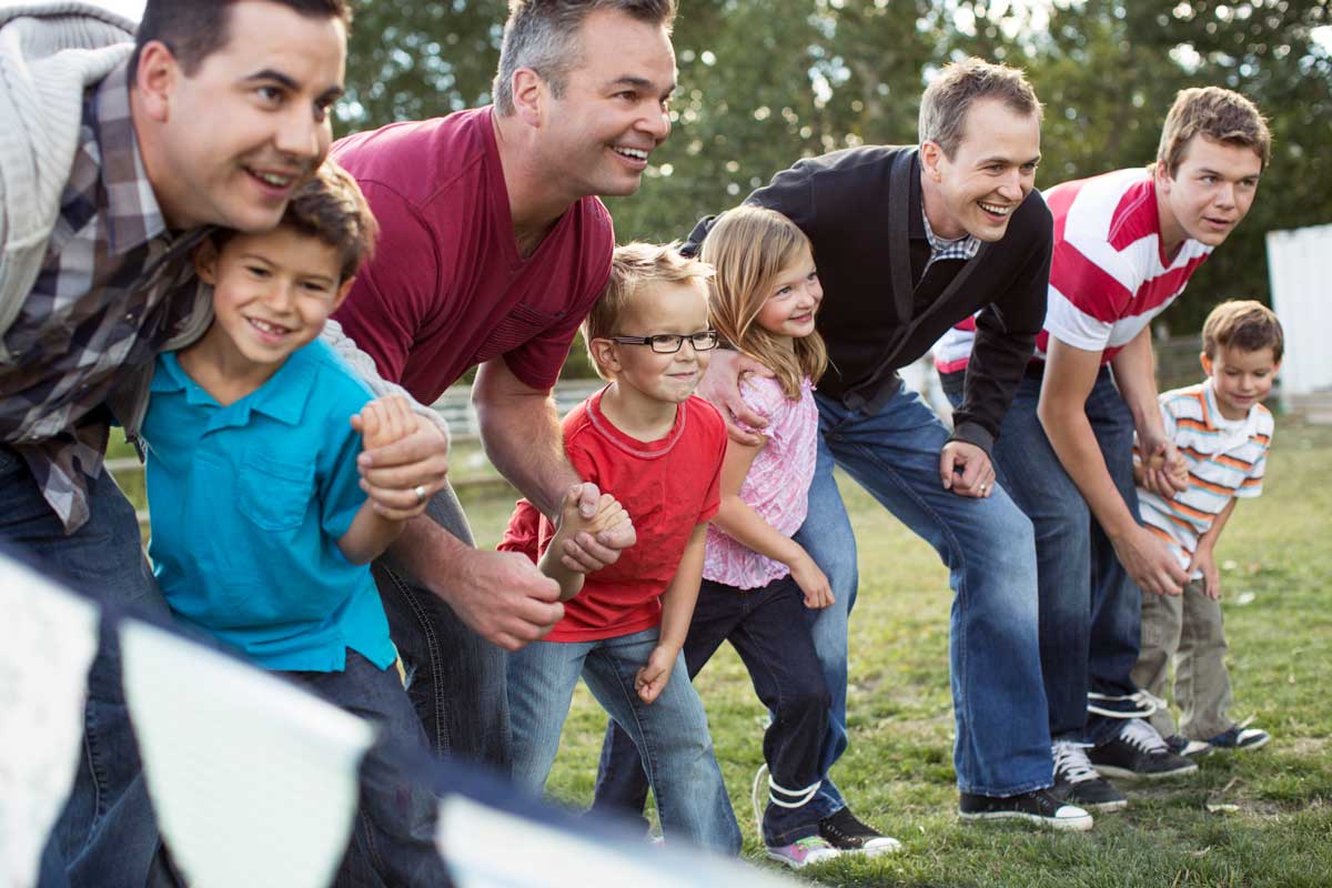 fathers and children lined up to race outside