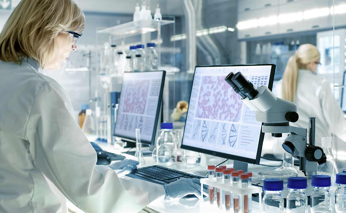 A female researcher works in a lab