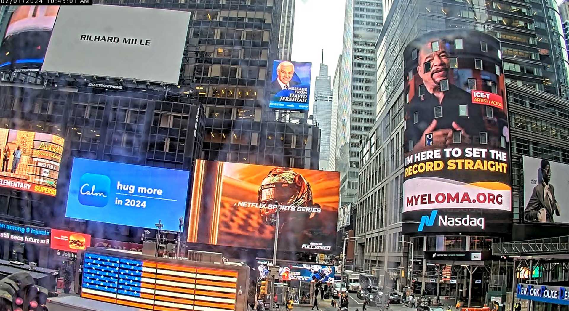 Ice-T IMF PSA on New York Times Square NASDAQ screen