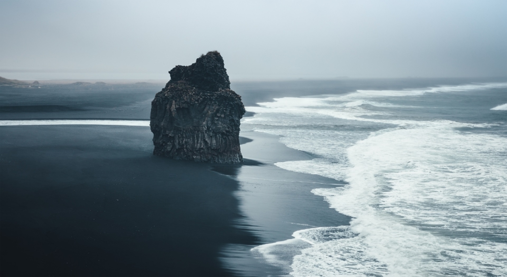 black-sand beach in reynisfjara, iceland