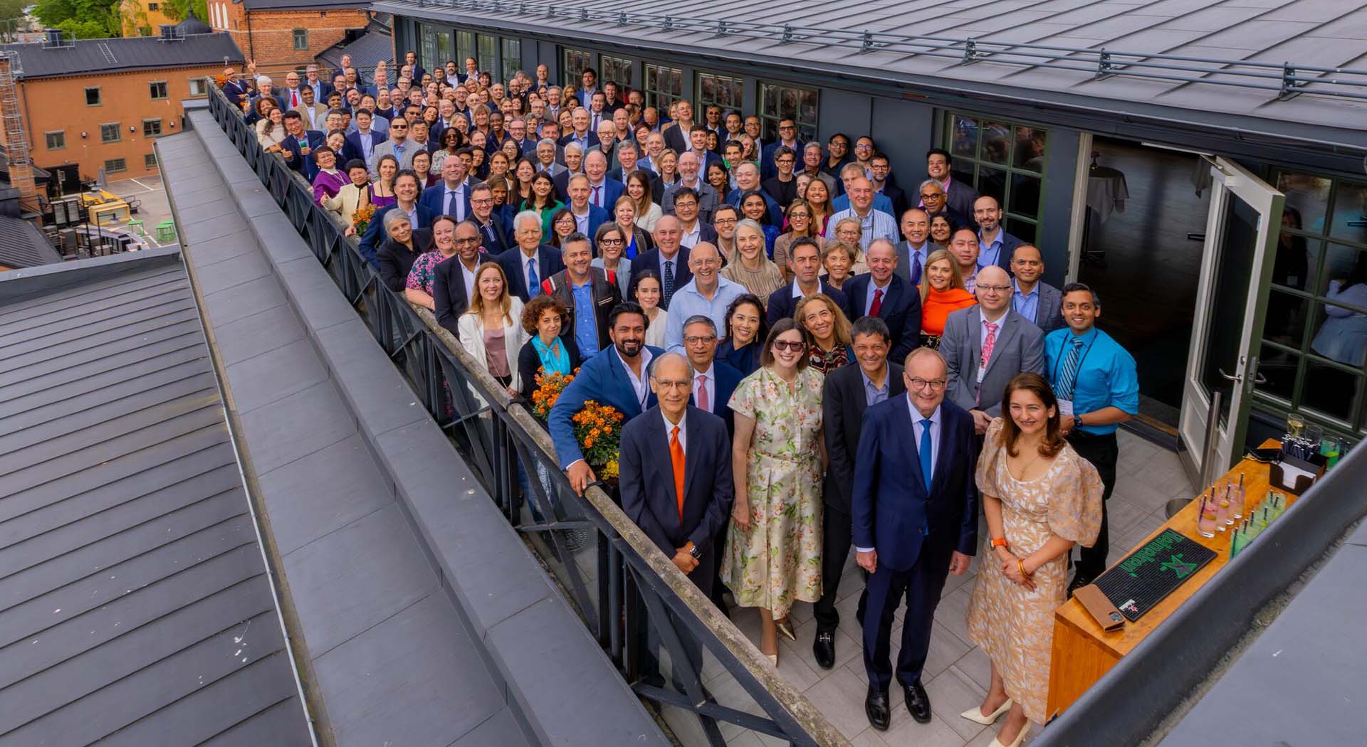 Members of the IMWG gather to celebrate Professor Hermann Einsele and Dr. Noopur Raje: (front row) Dr. Nikhil Munshi, Heather Cooper Ortner, Dr. S. Vincent Rajkumar, Prof. Einsele, and Dr. Raje. 