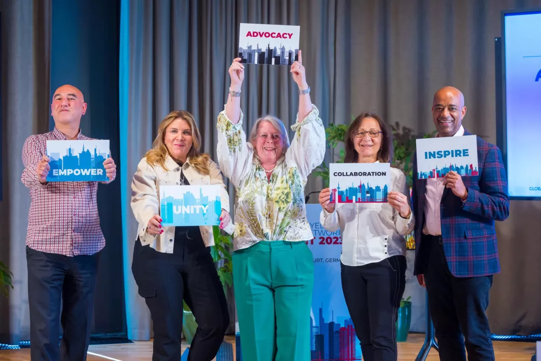 Global Myeloma Action Network (GMAN) leaders with signs