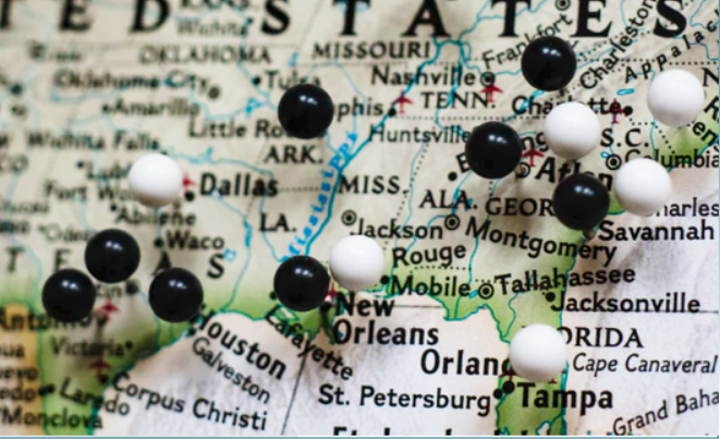 Map of United States with push pins in it