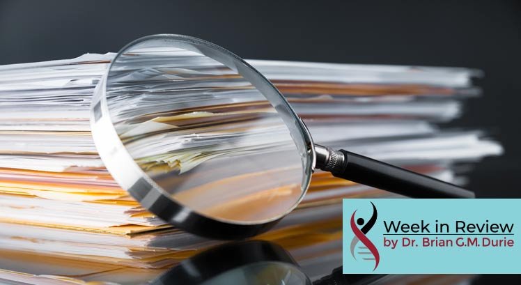 File folders with a magnifying glass