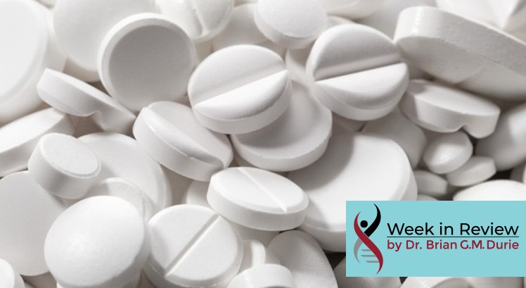 image of a pile of white aspirin pills