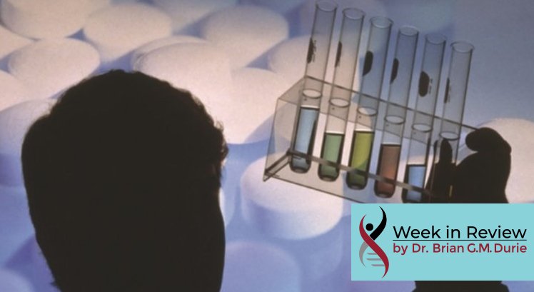silhouette of man staring at test tubes