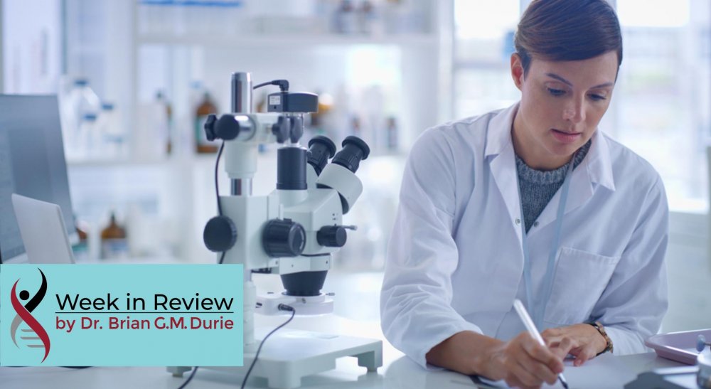 lab researcher with microscope