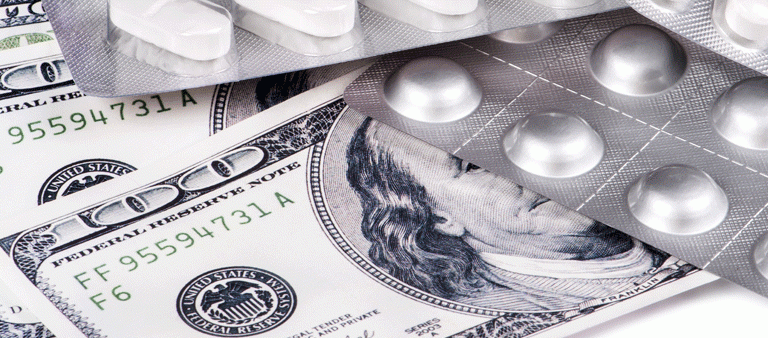 100 dollar bills and medicine