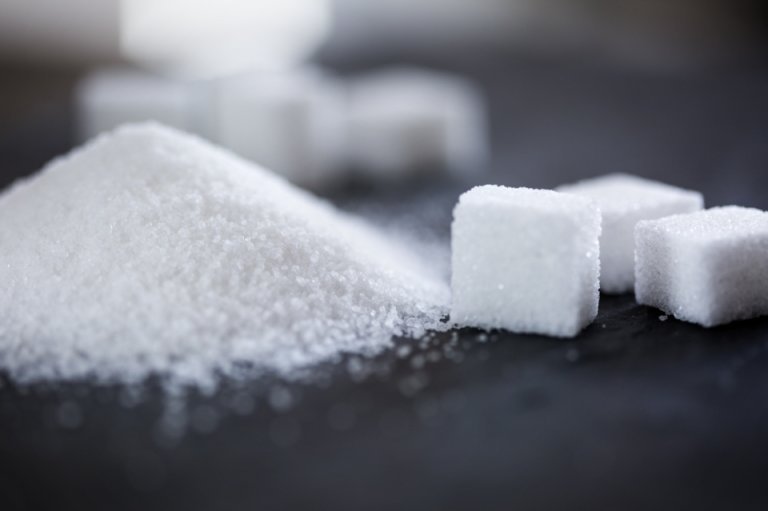 heap of sugar with sugarcubes