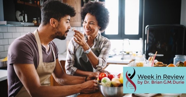 young couple cooking in kitchen