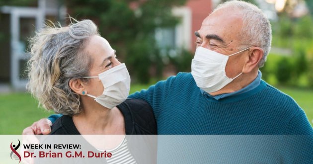 Couple are wearing face masks outdoors