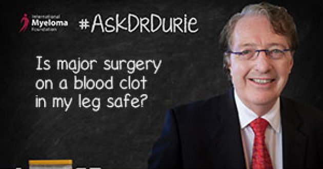 Dr. Durie in front of a chalk board