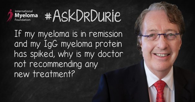 Dr. Durie in front of chalk board