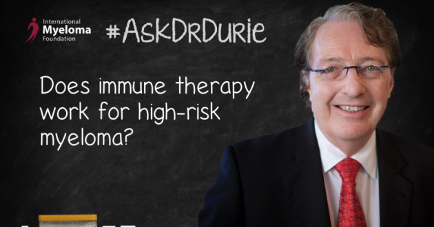 Dr. Durie in front of a chalk board