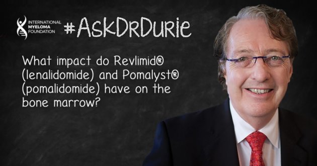 Dr. Durie in front of chalk board