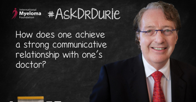 Dr. Durie standing in front of a chalk board