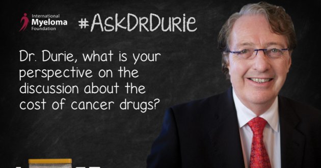Dr. Durie in front of a chalk board