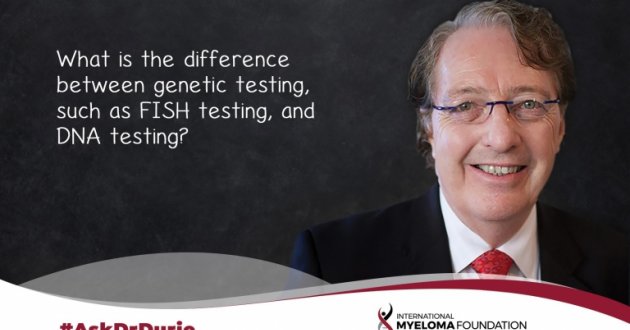 Dr. Durie in front of a chalk board