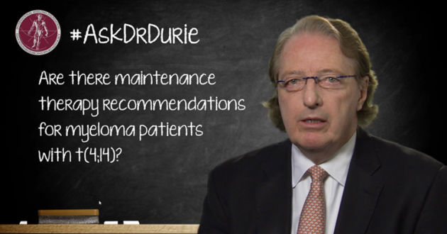 Dr. Durie in front of a chalk board