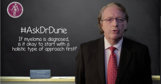 Dr. Durie headshot in front of chalk board