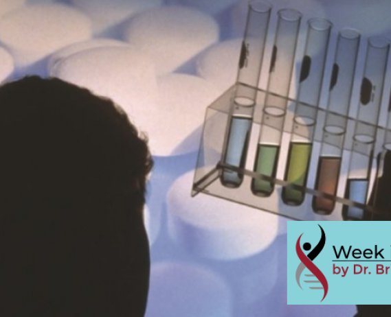 silhouette of man staring at test tubes