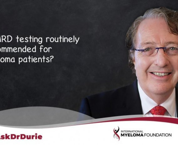 Video still of Dr. Brian G.M. Durie with backdrop of a chalkboard and text overlay: "Is MRD testing routinely recommended for myeloma patients?"