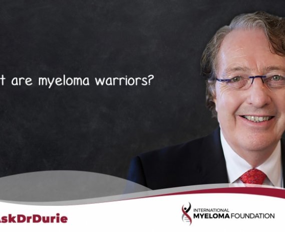 Video still of Dr. Brian G.M. Durie with chalkboard backdrop and text overlay: What are myeloma warriors?
