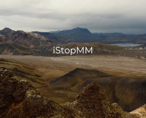 iStopMM 2 text overlaid on image of a valley