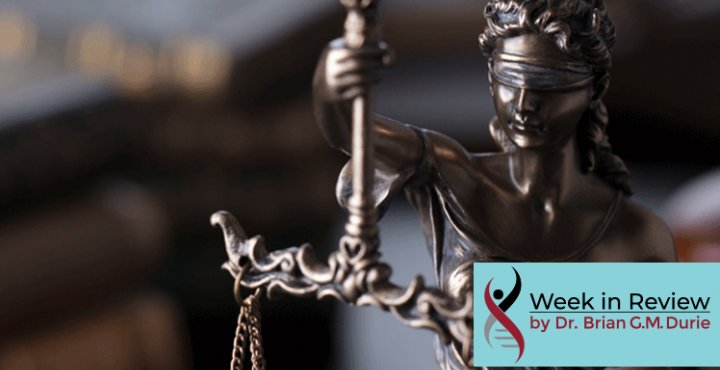 Bronze statue in front of law books