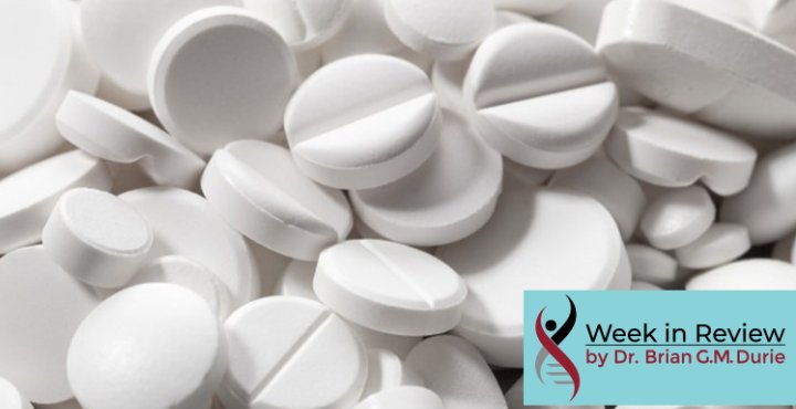 image of a pile of white aspirin pills