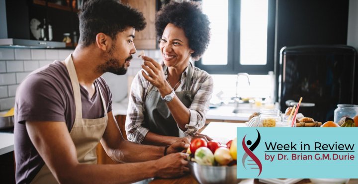 young couple cooking in kitchen