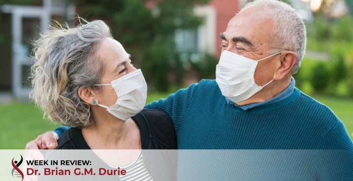 Couple are wearing face masks outdoors