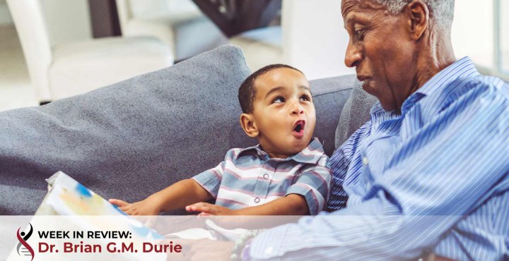 Grandfather reads to his grandson
