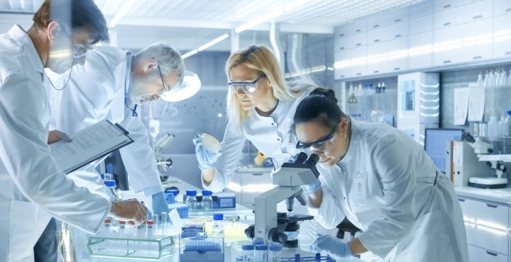 Team of Medical Research Scientists Work in a Lab