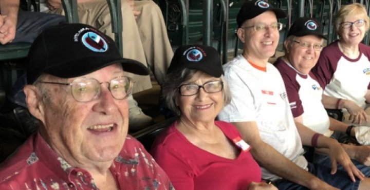 support group warriors watching baseball game