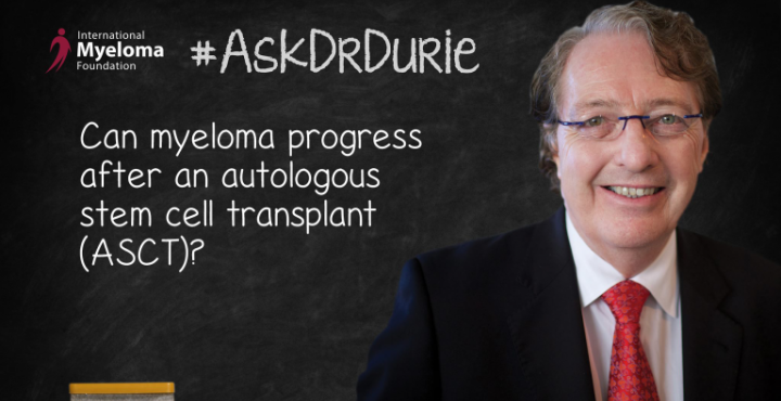 Dr. Durie in front of a chalk board