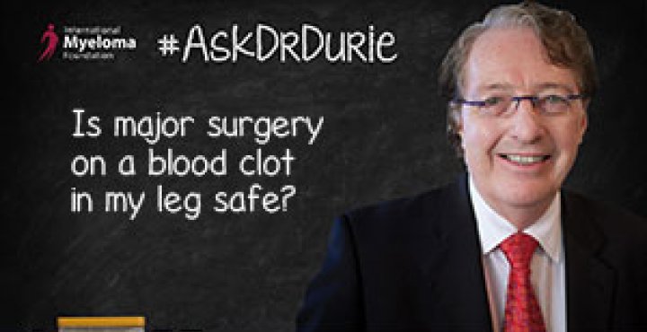 Dr. Durie in front of a chalk board