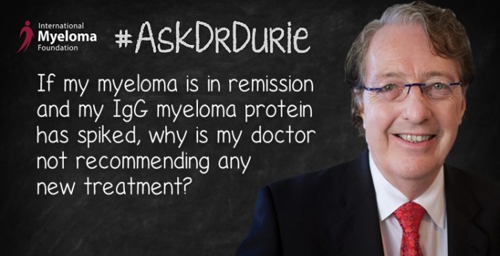 Dr. Durie in front of chalk board