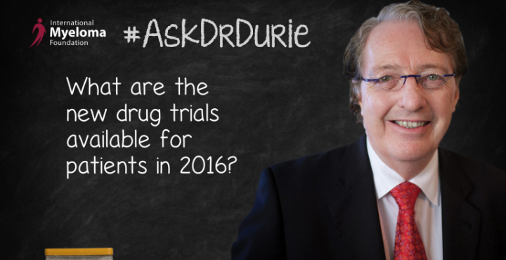 Dr. Durie in front of a chalk board