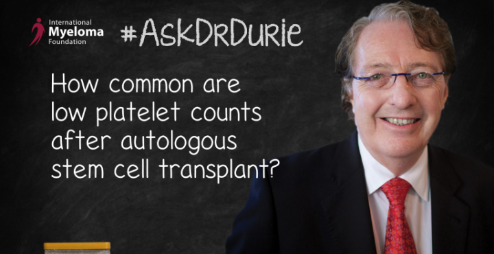 Dr. Durie in front of a chalk board