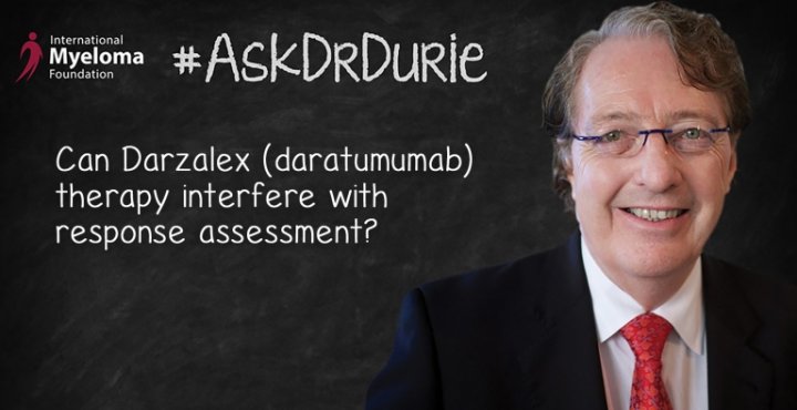 Dr. Durie in front of a chalk board