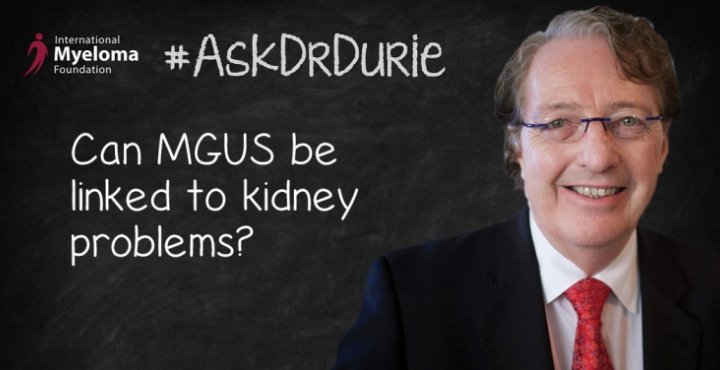 Dr. Durie in front of a chalk board. 