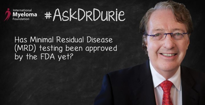 Dr. Durie in front of chalk board