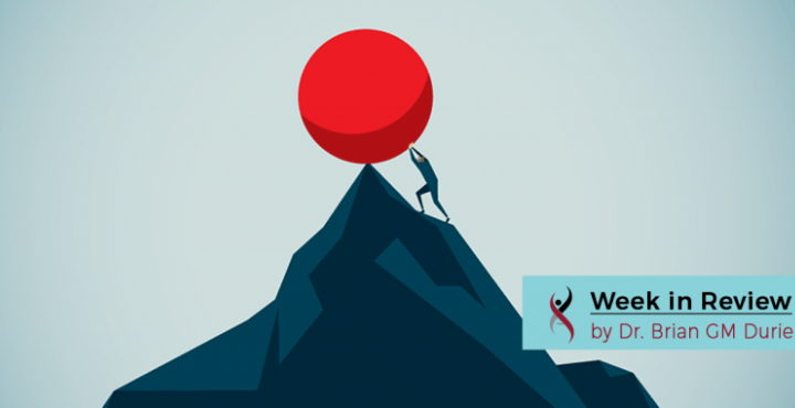 Sisyphus pushing a boulder up a mountain