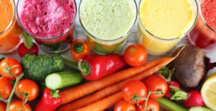 An assortment of vegetables and vegetable juices