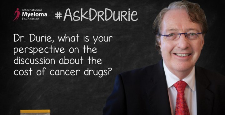 Dr. Durie in front of a chalk board