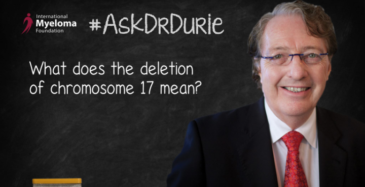  Dr. Durie in front of a chalk board
