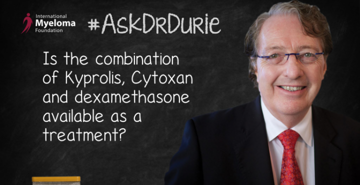 Dr. Brian Durie stands in front of a chalk board. 