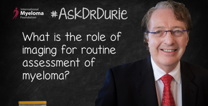  Dr. Durie in front of a chalk board